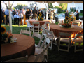 long island catered outdoor wedding dinner tables with sunflower centerpeices