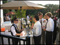 catered backyard wedding the bar is open