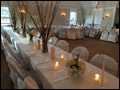 candle lit hall ready to receive wedding guests