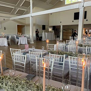 Candle lit hall in Suffolk County ready to receive wedding guests