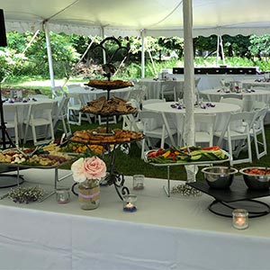 Cocktail table set up for outdoor wedding