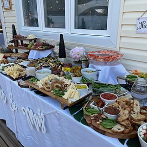 Cocktail hour at catered backyard wedding on Long Island