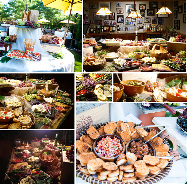 Tuscan style catering featuring a plentiful display of antipasto presented on marble, aged wine crates and terracotta