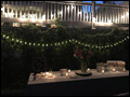 romantically lit backyard at a off premise catered wedding on Long Island