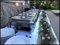 classic catered buffet line waiting for guests at a Long Island backyard wedding
